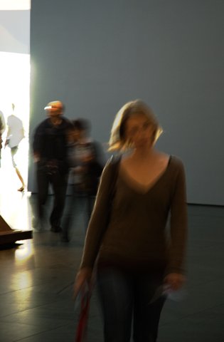 I love taking blurry pictures in museums. The environment is so structured yet simple, and the low light usually means longer, blurry exposures, which abstract the scene the same way a painting does.